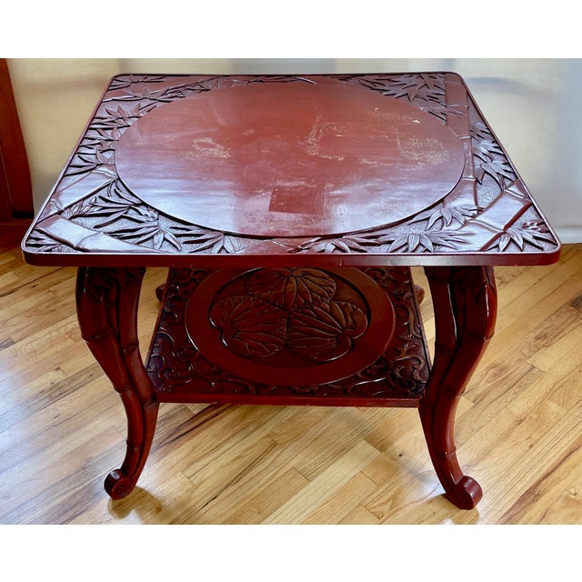 This is an exceptional antique Chinoiserie-style hardwood, brick-red lacquered center hall, occasional, or side table. The...