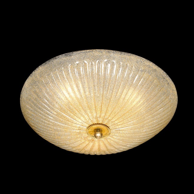 This exquisite mid-century modernist chandelier by Barovier & Toso, hand-blown in Murano, Italy circa 1950, is a radiant...