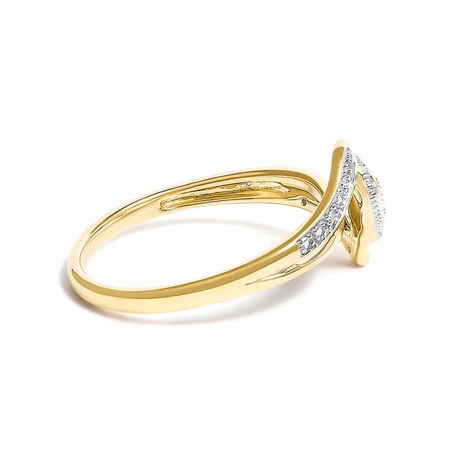 Crafted from the radiant warmth of 10K yellow gold, this exquisitely designed ring evokes a promise of timeless romance....