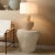 A crystal-clear acrylic base and a creamy linen drum shade expertly elevate an otherwise casual coastal lamp. The curvy...
