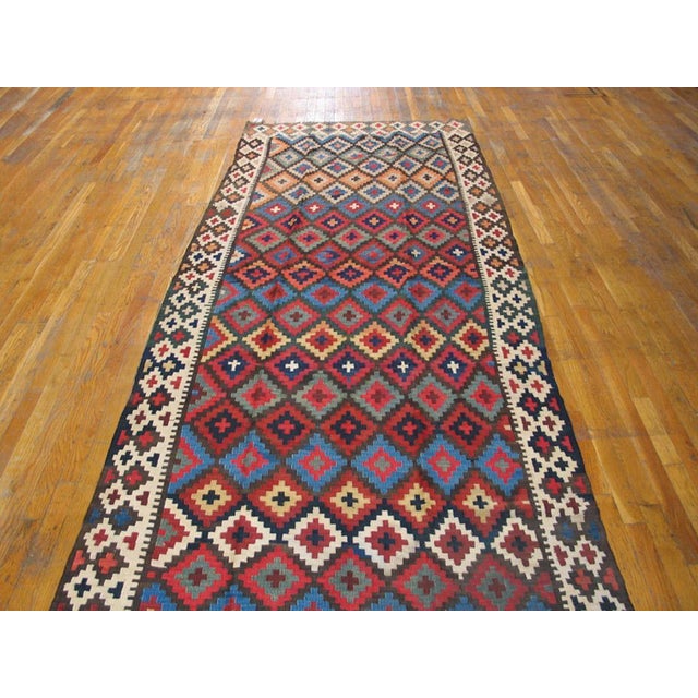 Antique Kilim - N.W. Persian rug, size 4'6" x 11'6". Antique Kilim - N.W. Persian Persian Flat Weave Rug, Country of...