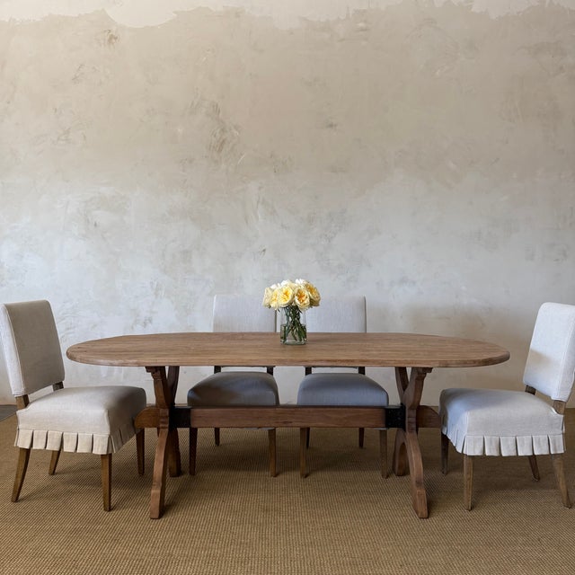 The Costa Dining Table is crafted from solid reclaimed fir & pine and finished in a weathered natural finish, this oval...