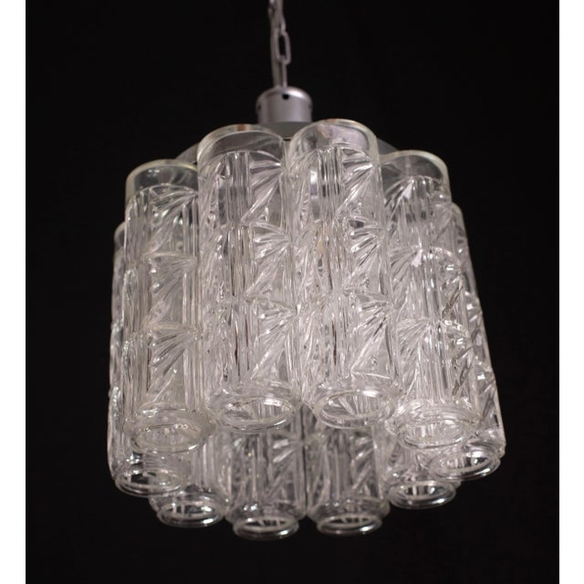 1960s Murano chandelier 10 transparent logs. The chandelier currently mounts 1 light, possible to rewire for Usa standard....