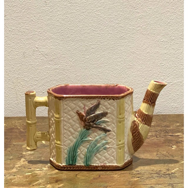 A 19th-century English majolica tea pot, without the lid.