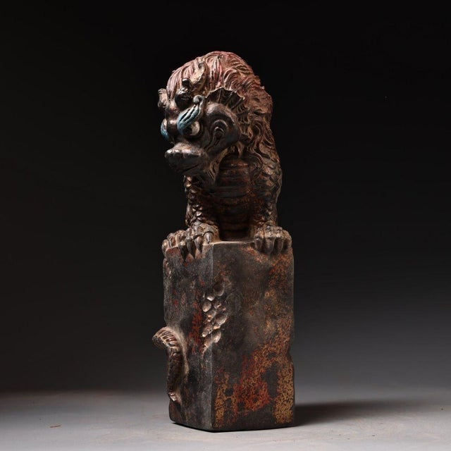 This striking sculpture depicts a mythical beast, drawing inspiration from traditional guardian lion and water beast...