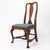 A Boston Queen Anne side chair, built in old-growth mahogany with a scalloped seat rail and cabriole legs ending in pad...
