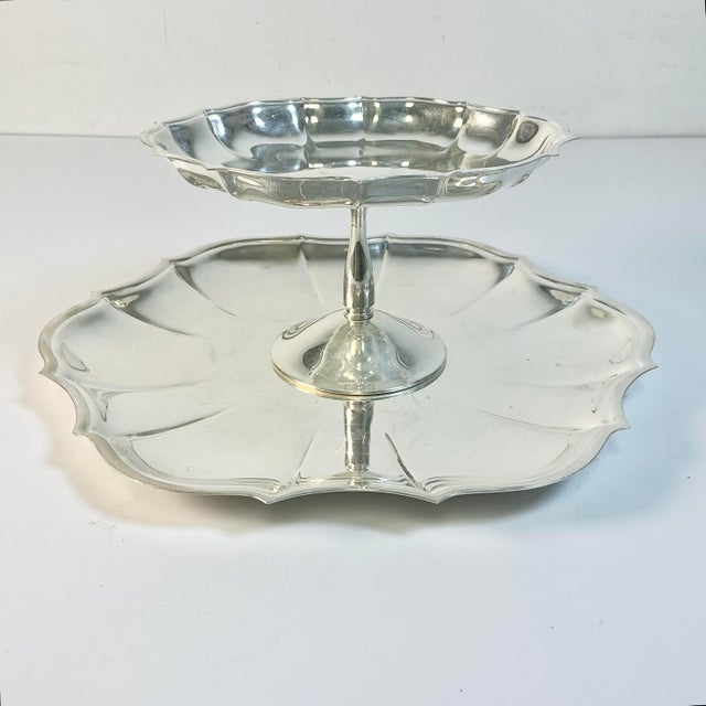 This two pieces silverplate set is from International Silver Co. It consists of a pedestal Compote and a Serving Tray....