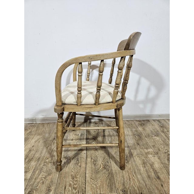 The classic oak captain's chair combines solid, rustic construction with elegance. The characteristic low, arched backrest...