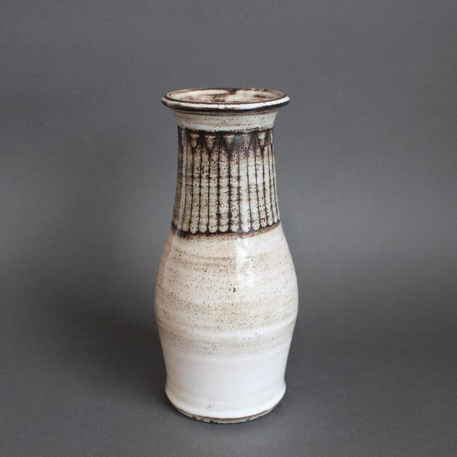 Mid-century French ceramic vase by J acques Pouchain / Atelier Dieulefit (circa 1960s). Classic vase with bulbous mid-...