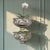 An exceptional pair of vintage silverplate meat domes thoughtfully reimagined as sculptural wall pockets, offering a...