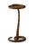 A striking sculptural accent table that embodies both artistry and allure. The coiled serpent base, cast and finished in...