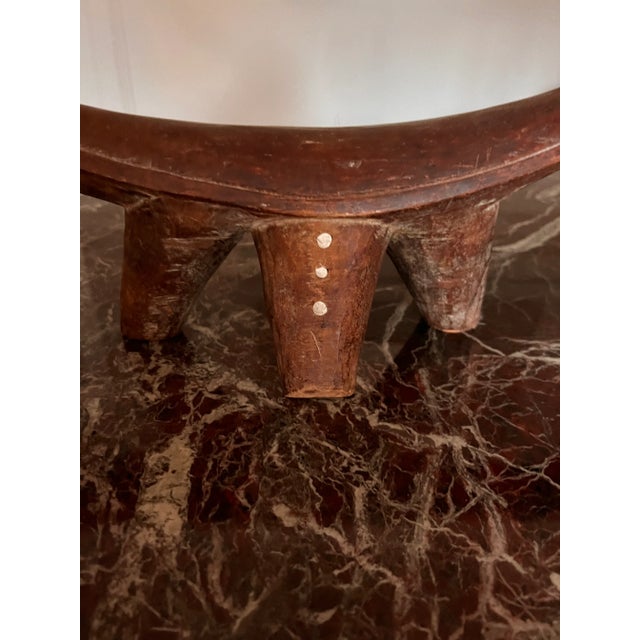 Dinka headrest from Sudan. The stunning craftsmanship of this beautiful sculptural piece will dress up any space in your...