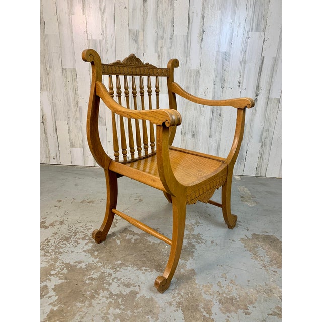 Beautiful quarter sawn oak hall chair in the Renaissance style with Lyre back and curved legs. The sculptural presence of...