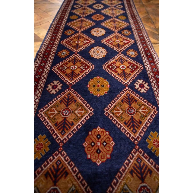 This rug comes from the Caucasus region, specifically from the city of Ganja in Azerbaijan. Ganja is known for its long...