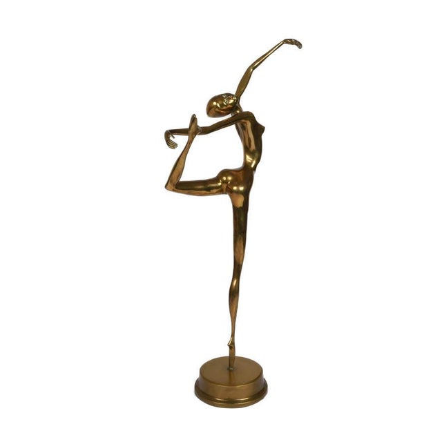 This signed bronze figural ballerina by Sepy Dobronyi is a refined limited-edition sculpture that captures the grace,...