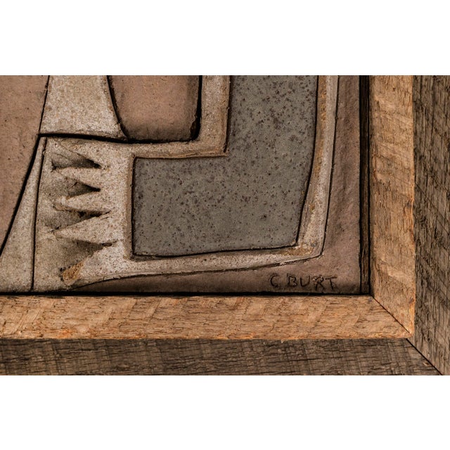 Clyde Burt framed ceramic wall relief.
