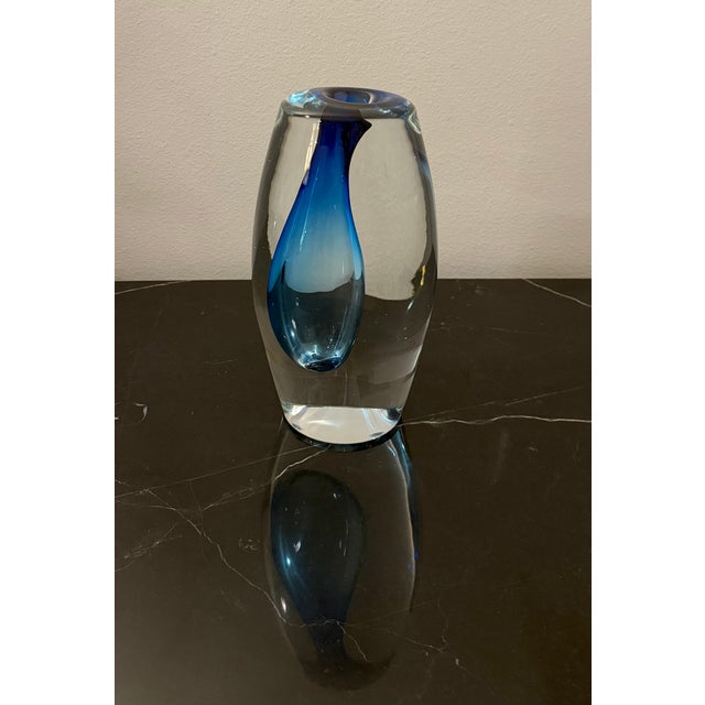 Handcrafted in Poland, the Offset Vase by Global Views is a sculptural art glass piece that blends modern form with...