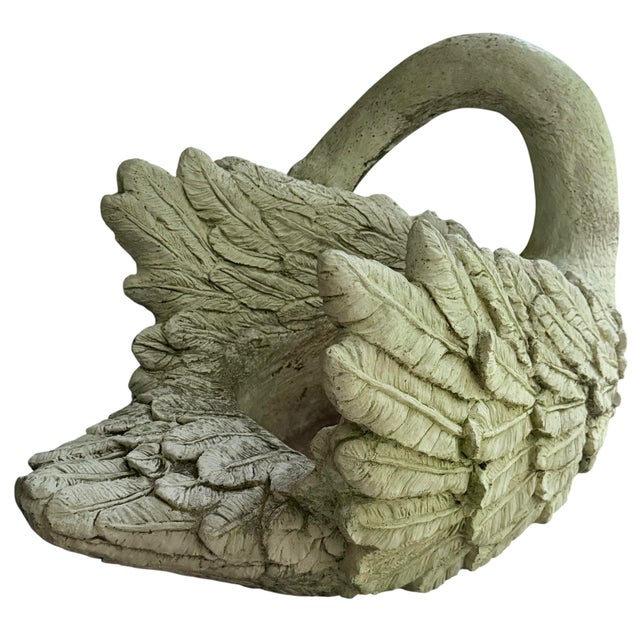 At nearly 30 inches wide, this is a monumental and highly collectible cast stone swan planter, hand-crafted in 1997 by the...