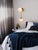 Influenced by the opulence of Hollywood Regency design, the Duo Sconce blends modern elegance with vintage glamour....