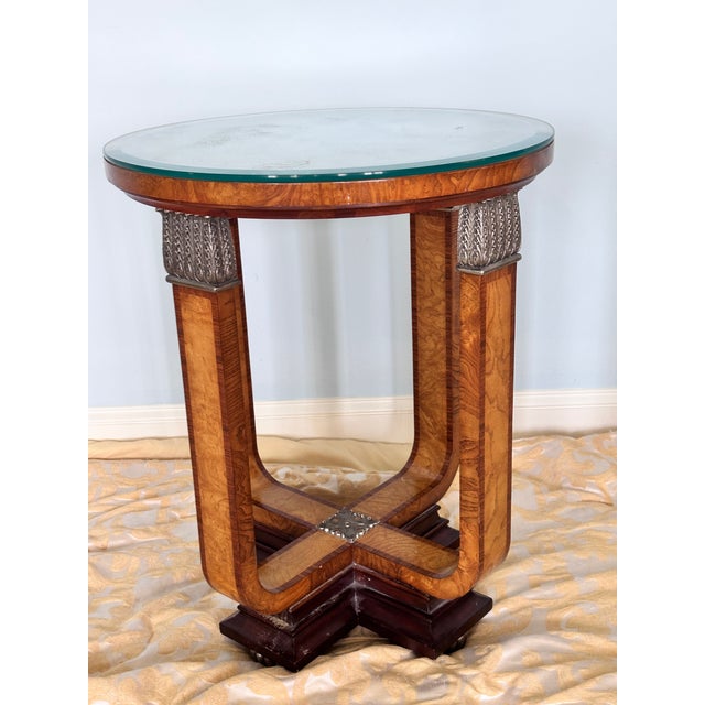 Elevate your living space with this exceptionally crafted, authentic Maitland-Smith round accent table. Bridging mid-to-...