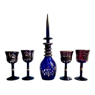 Mid 20th Century Gilt Decorated Bohemian Cobalt Blue Glass Decanter & 4 Stemmed Ruby Glasses Set For Sale
