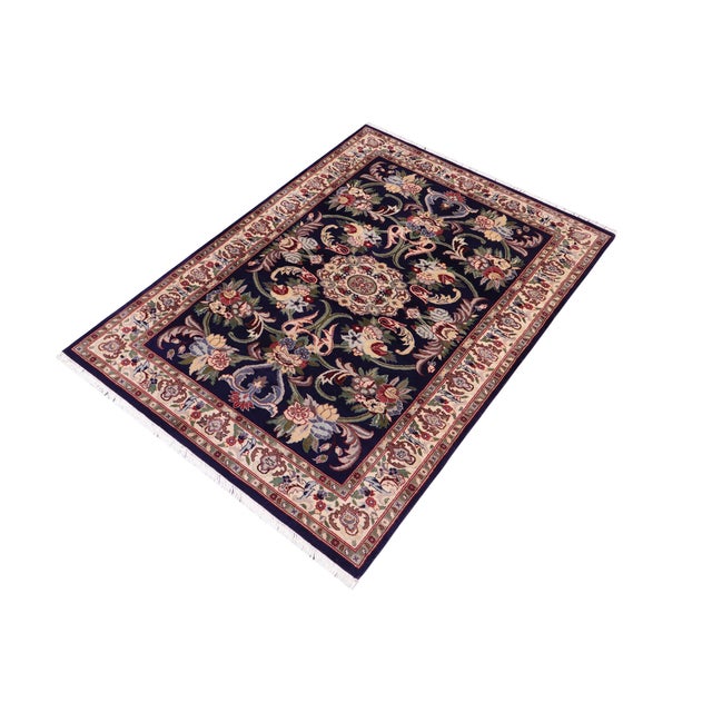 Designed with mesmerizing intricacy and gorgeous color palette, this hand-knotted masterpiece demonstrates the beauty and...