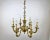 Vintage Gilt Bronze Chandelier with beautiful bronze chain. For 6 light bulbs. France, circa 1960s'. The chandelier is...