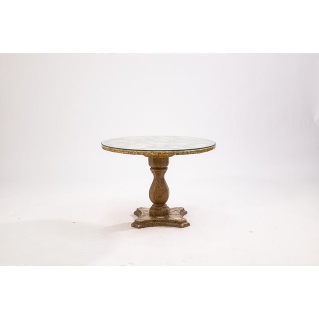 An Arturo Pani circular Hollywood regency style side table. This wonderful handmade accent table features a stunning...