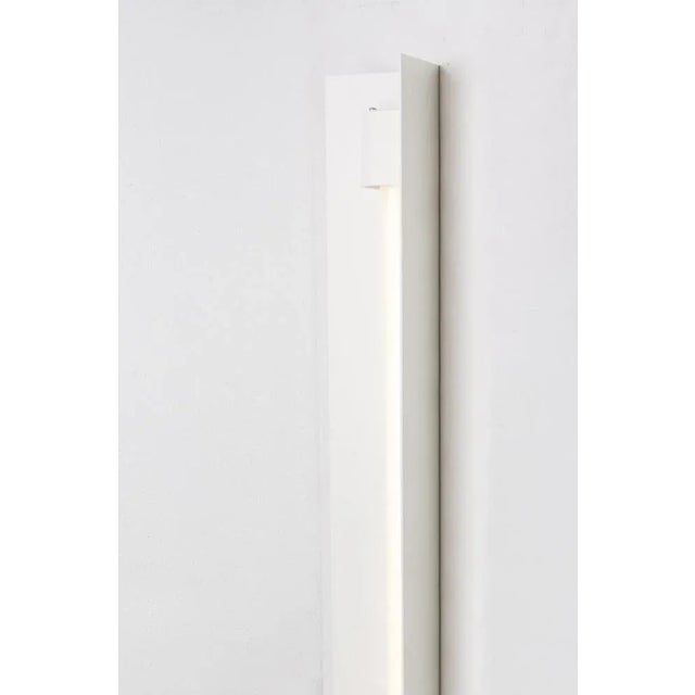 Medium misalliance ral pure white wall light by lexavala dimensions: d 16 x w 100 x h 8 cm materials: powder coated...