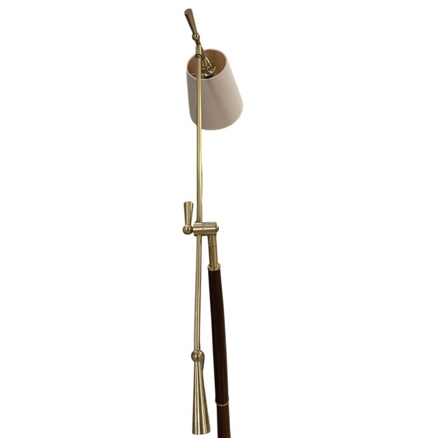 A refined pair of scriptreader ii adjustable floor reading lamps by american maker frederick cooper, produced in the...