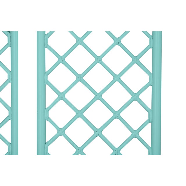 Bring a touch of modern sophistication to your bedroom with the stunning X & Diamond bed. Handcrafted from rattan, each...