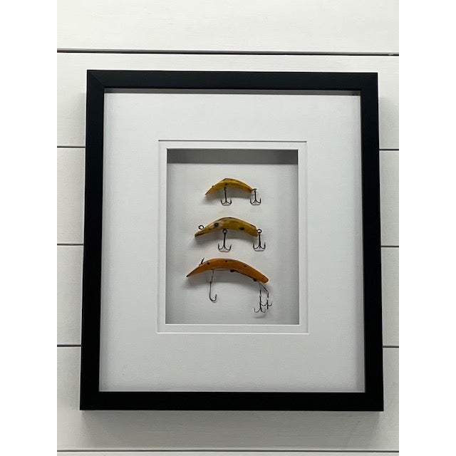 Vintage fishing lures in a double matted shadow box frame. Custom made with UV acrylic.