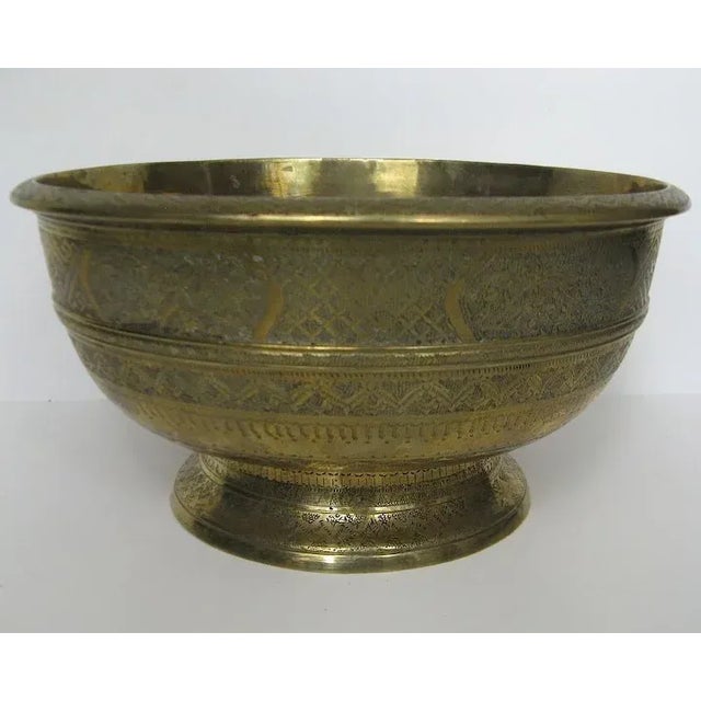 Beautifully made brass decorated footed bowl. Measures 9 1/2" diameter by 5" tall. Very good condition. (container 1)