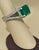 A classic, Cocktail ring Approximately 8.5 Carat Emerald cut Emerald and 4 ct of Round brilliant cut diamond Ring, Estate....