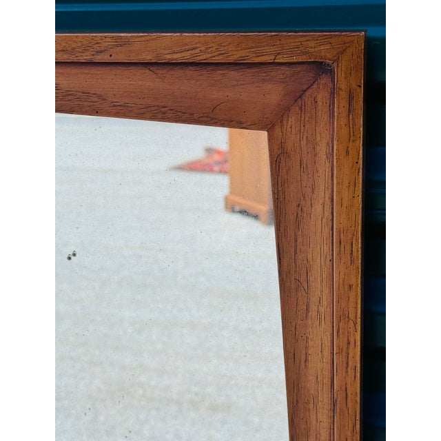 Elevate your space with a touch of mid-century sophistication. Crafted during the golden era of American furniture...
