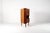 A lovely compact cabinet from the 1960s, made in Denmark in the Scandinavian modern style. The piece is built from warm...