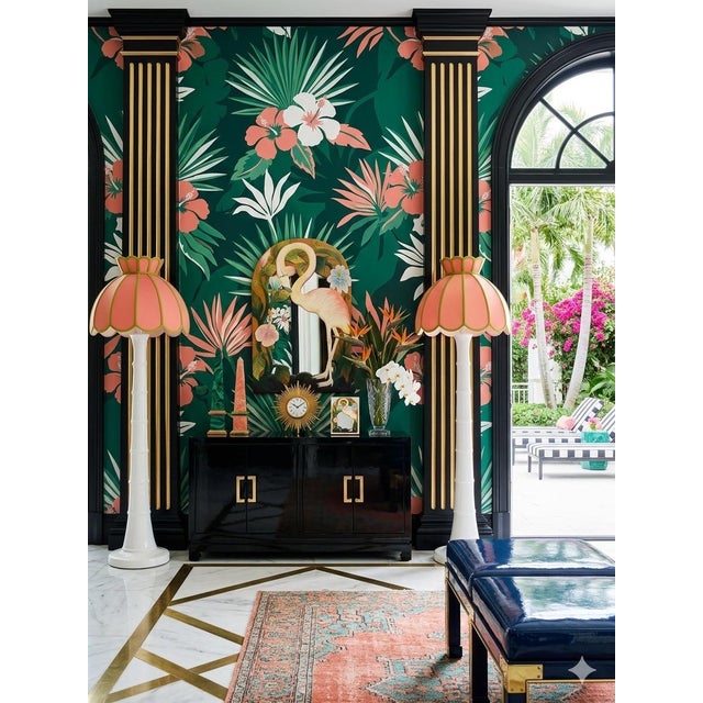 This enchanting hand-carved wall mirror is a rare, sculptural celebration of Palm Beach Regency glamour. Featuring a...