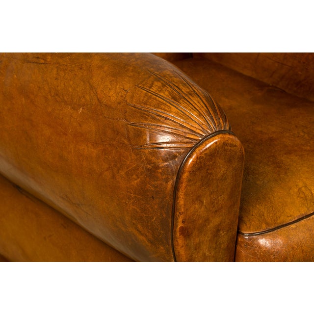 Sourced in Provence, France, this exceptional pair of 1920s French Art Deco club chairs embodies the bold craftsmanship...