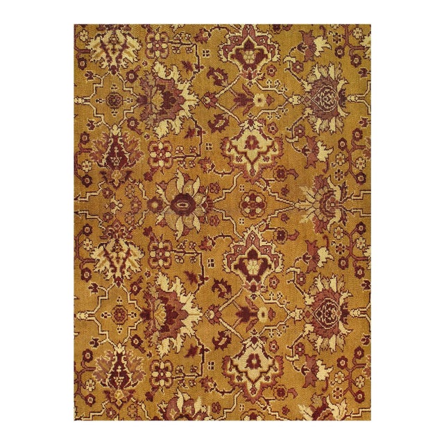 In the grand, classic Mughal tradition, a lush design of swaying vines, leaves, and palmettes undulates gracefully across...