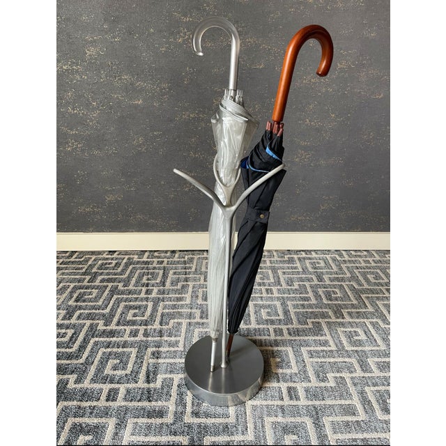 Luminaire Chicago's - Modern aluminum three (3) ring umbrella stand.