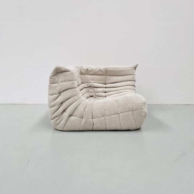 This Togo has been reupholstered with new foam and leather, preserving its shape & iconic looks.The bottom could show some...