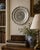 A handsome mid-20th-century French pewter wall plate by Les Etains du Prince, centered by the heraldic coat of arms of...