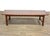 A mid century modern walnut coffee table with lipped ends made by Lane Furniture. Professionally refinished. 56.25” wide....
