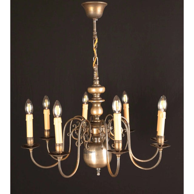 Interesting Dutch-style bronze chandelier. The eight-armed design is also suitable for a larger room. The chandelier is...