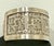 Just over 1.25” wide sterling silver Tibetan Om Mani cuff. 8” adjustable. Weighs 40 grams. Stamped 925.
