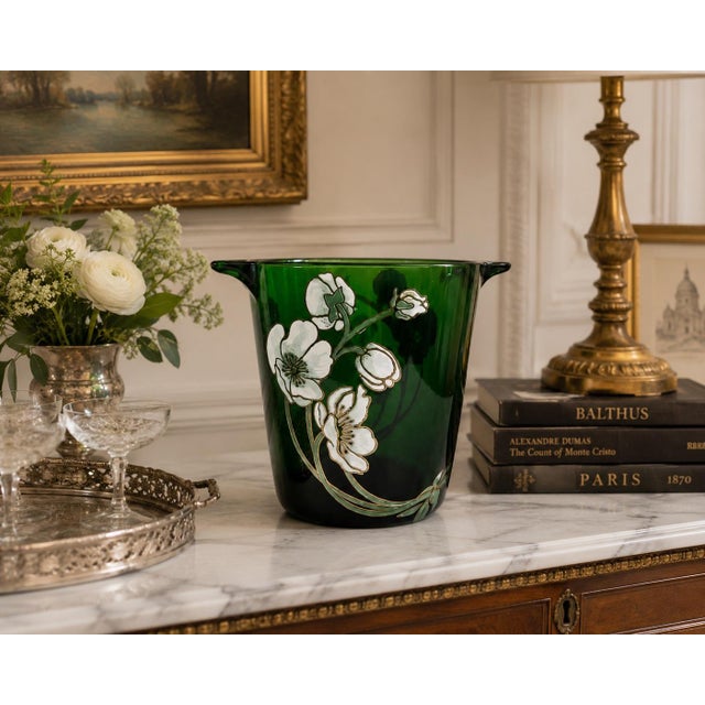 Striking vintage French emerald-green glass champagne bucket featuring a graceful white, pale green and gold-toned anemone...