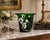 Striking vintage French emerald-green glass champagne bucket featuring a graceful white, pale green and gold-toned anemone...