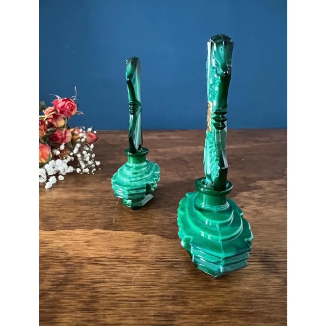 A rare and elegant pair of vintage Czech malachite glass perfume bottles, crafted in rich emerald green pressed glass with...