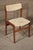 Set of four dining chairs with soft teak frames and upholstered seat and back. Danish made Mid-Century Modern design.
