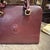 A 1990s Elegant Bordeaux Leather and Brass Top Handle Bag by Cartier For Sale - Image 12 of 15